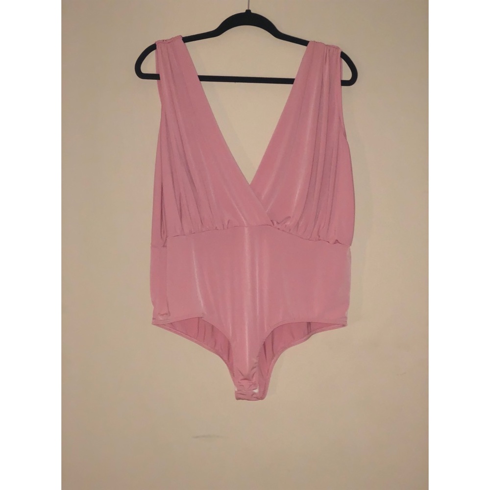 Pink sleeveless body suit